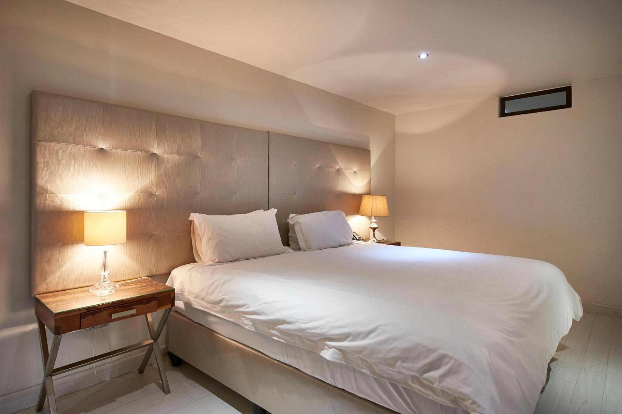 Dynasty Forest Sandown Serviced Apartments & Self Catering Hotel جوهانسبورغ الغرفة الصورة